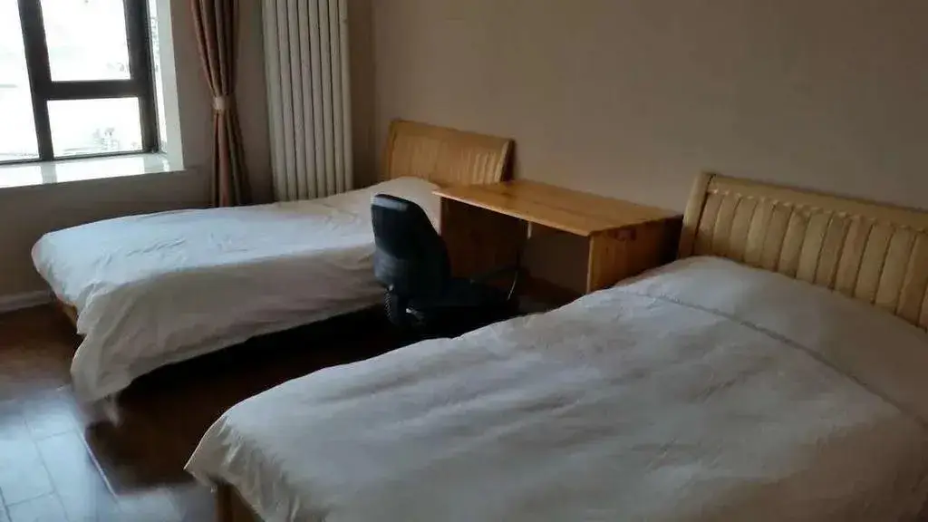 Циндао: Qingdao Yilin Youth Hostel