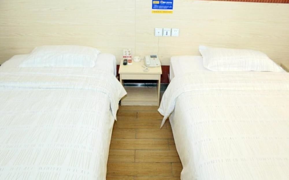 Уси: Ejea Hotel