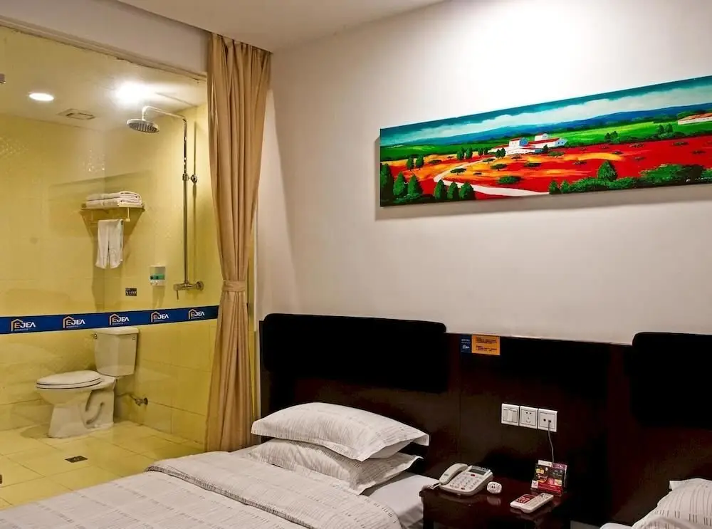 Уси: Ejea Hotel