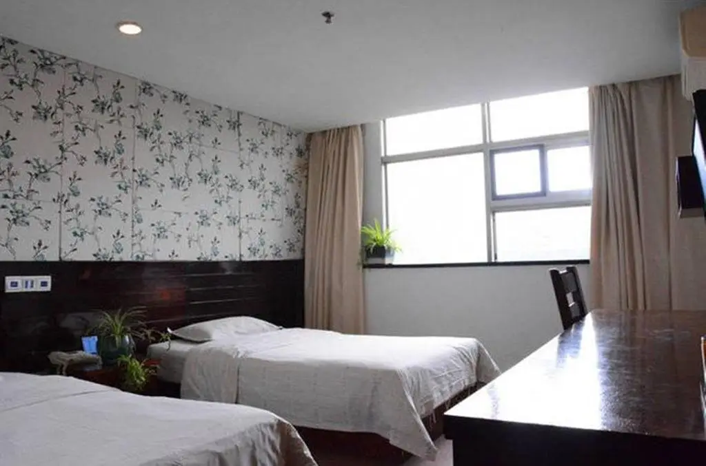 Уси: Ejea Hotel Central Station