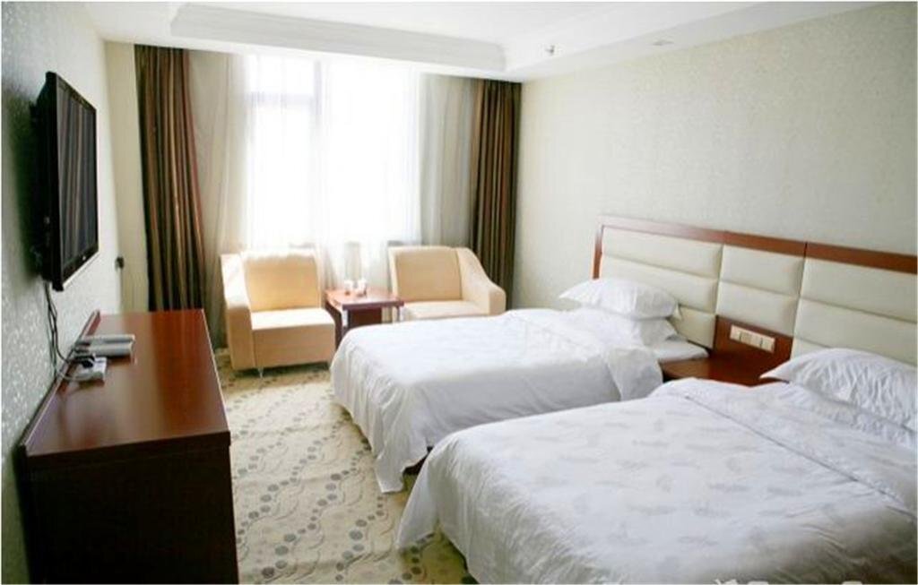 Guyuan Elite Holiday Hotel — фото 1