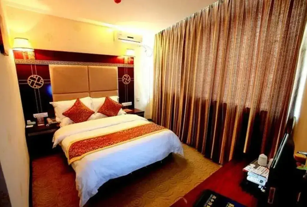 Синъи: Xingyi Yike Hotel