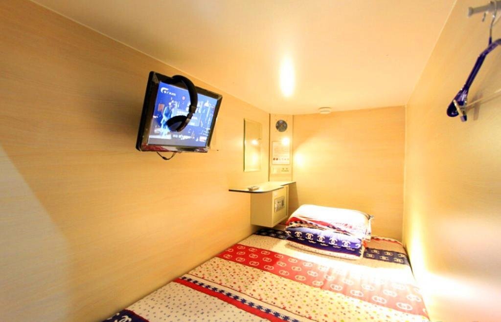 Чунцин: Suixingerxing Capsule Youth Hostel