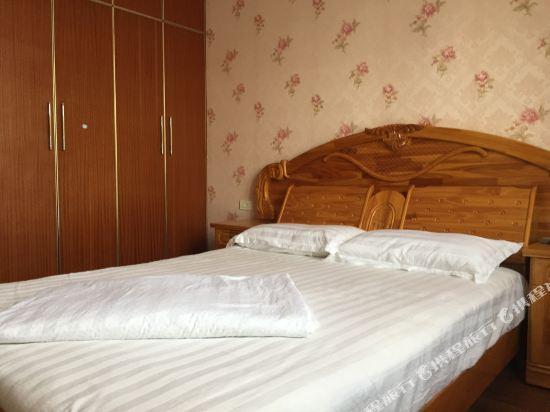 Чунцин: Chongqing Wuduqin Family Apartment
