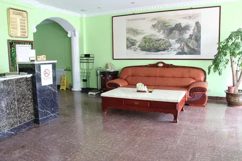 Qingdao Ri Yue Ju Hotel — фото 1