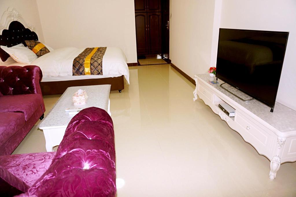 Гуанчжоу: Pazhou Theme Apartment
