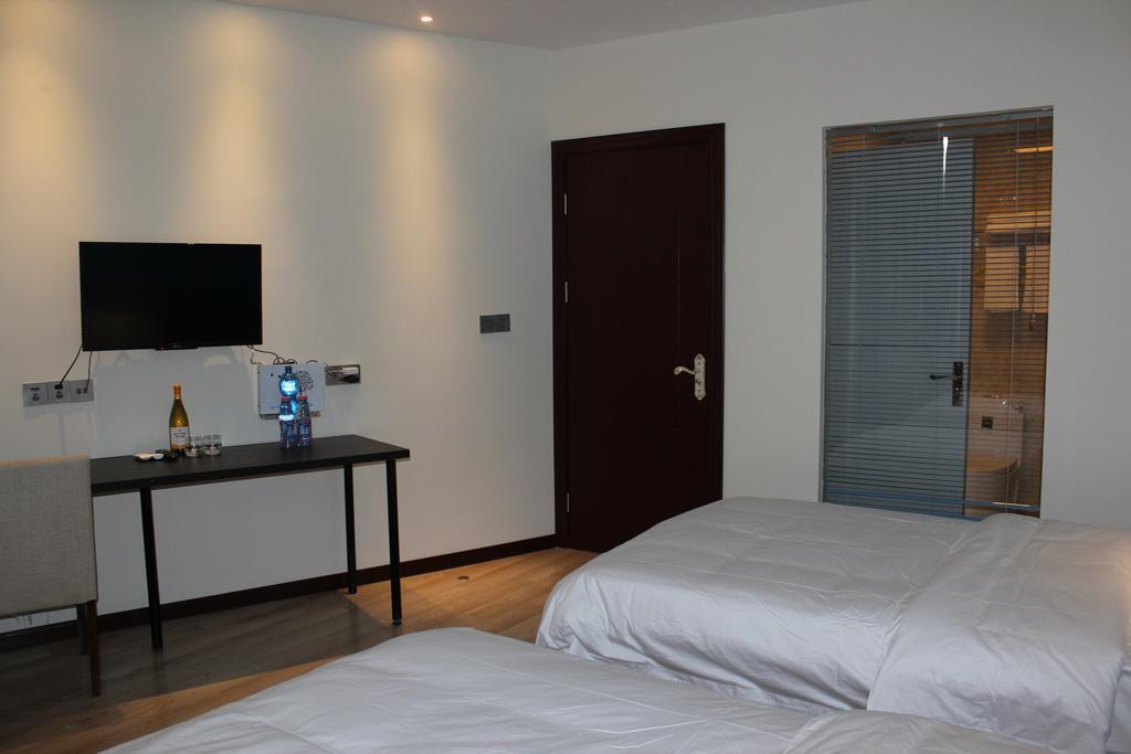 Уси: Laystay Hotel