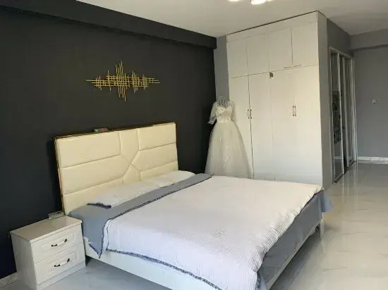 Харбин: Xinyi Apartment