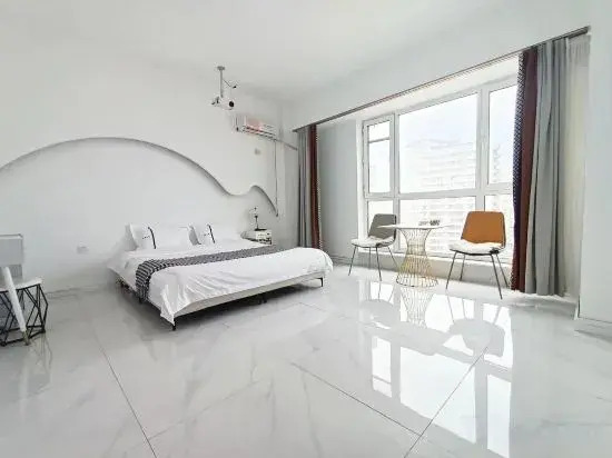 Харбин: Xinyi Apartment