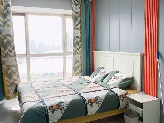 Харбин: Xinyi Apartment