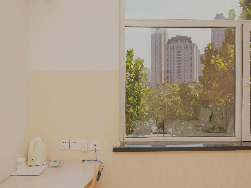 Тяньцзинь: 7Days Inn Tianjin Haihe East Road Wanda Centre