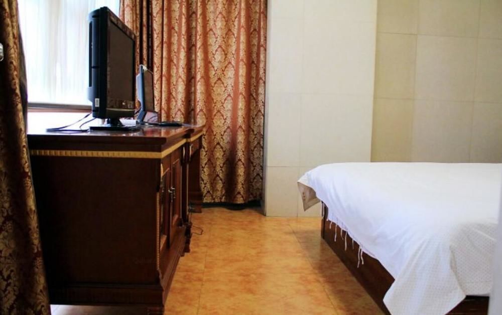 Kending Hotel Heping Studios Branch — фото 1