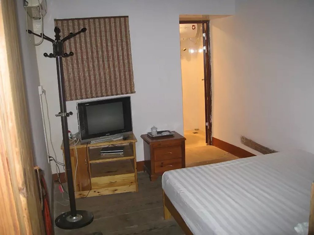 Жангжоу: Nanjing Tulou Qingdelou Inn