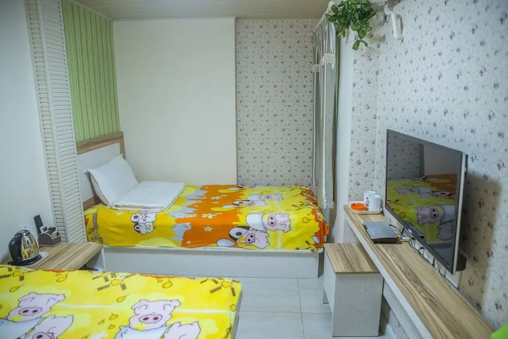 Циндао: Qingdao Haibianke Hostel