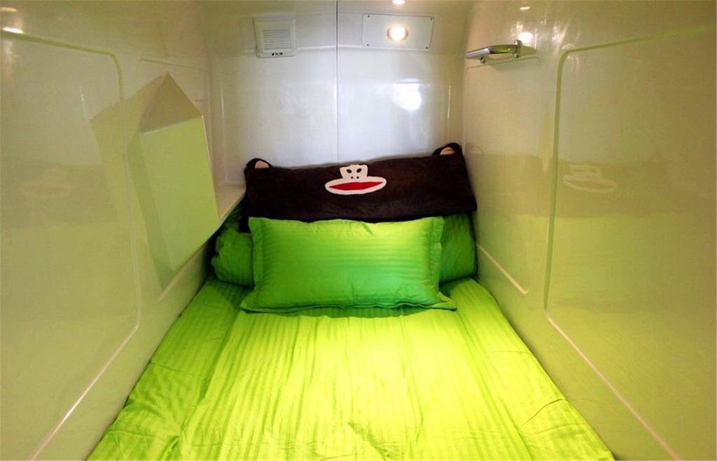 Вэйхай: Jianjia Capsule Hotel Weihai