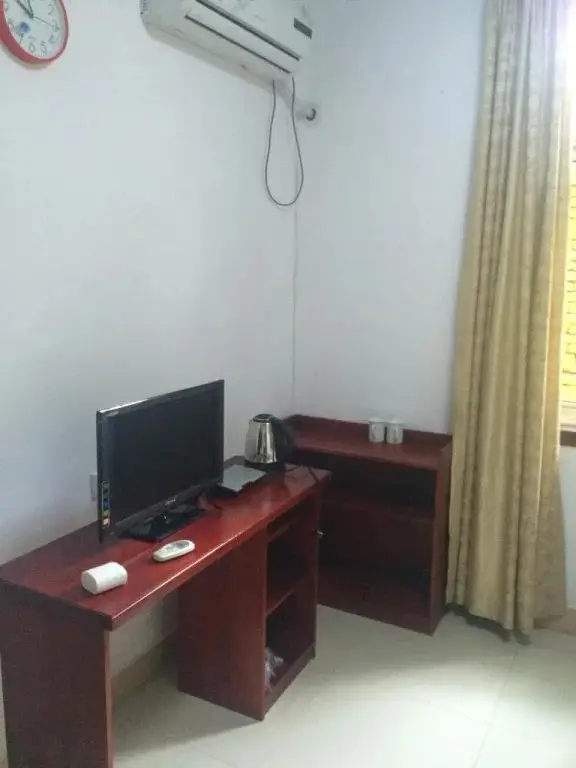 Циндао: Qingdao Guanhaichao Business Hotel