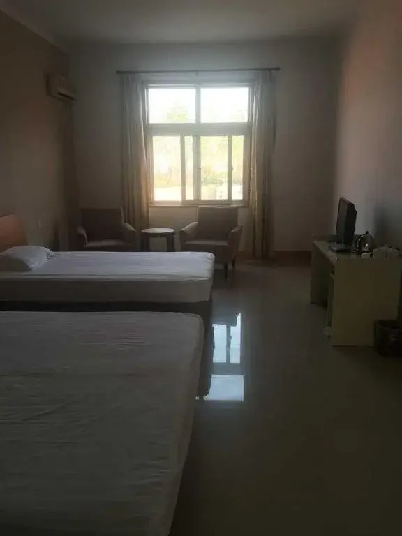 Циндао: Qingdao Guanhaichao Business Hotel