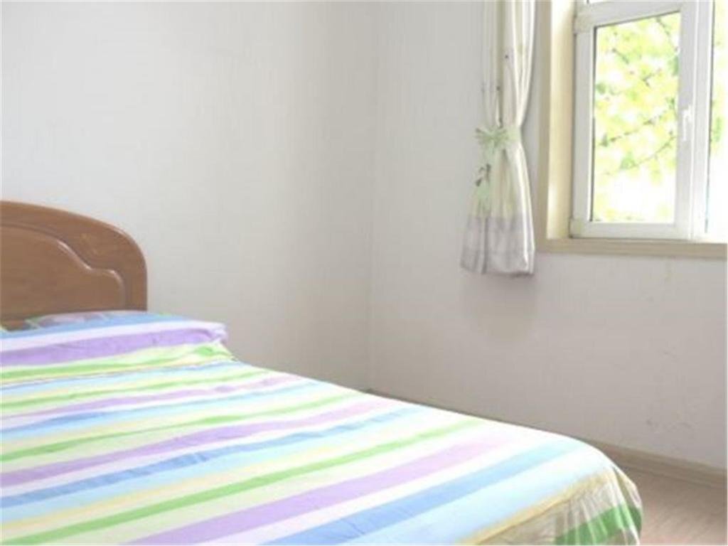 Циндао: Qingdao Guanhaichao Business Hotel