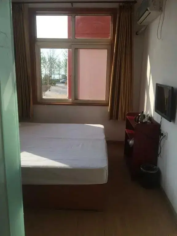 Циндао: Qingdao Guanhaichao Business Hotel