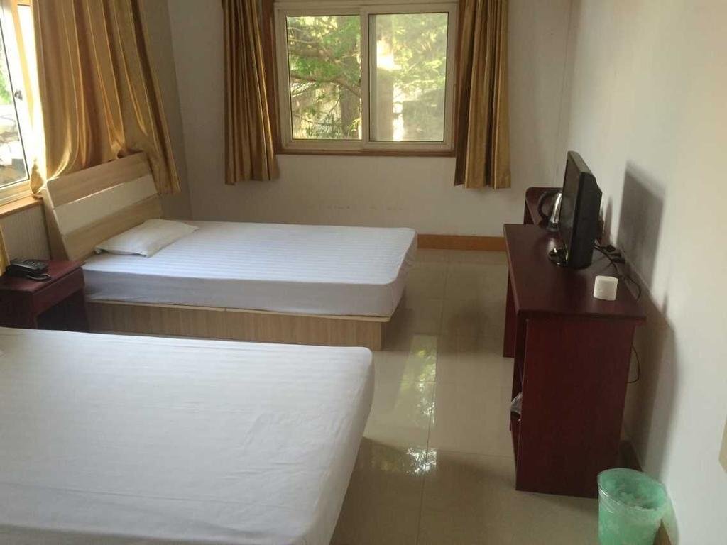 Циндао: Qingdao Guanhaichao Business Hotel