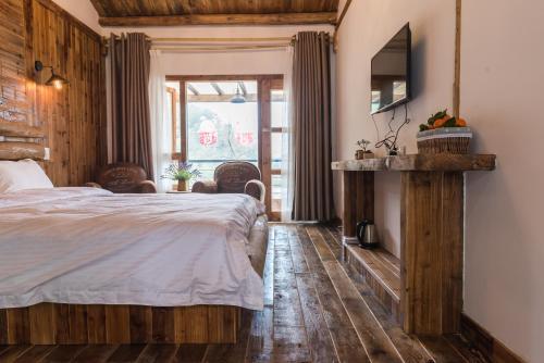 Хучжоу: Houwu Xinqing Life Inn