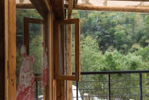 Хучжоу: Houwu Xinqing Life Inn