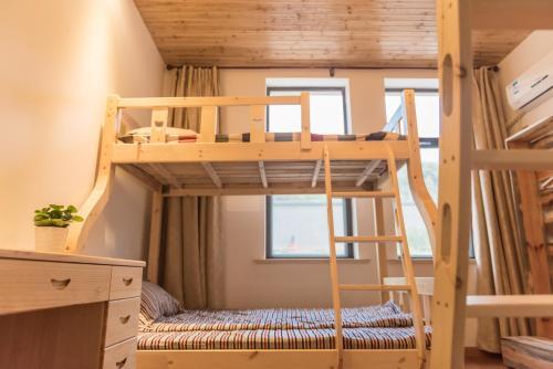 Хучжоу: Houwu Xinqing Life Inn