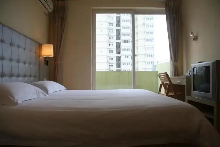 Циндао: Renjia Business Hotel - Qingdao