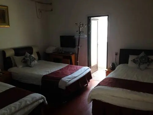 Жангжоу: Nanjing Tulou Maoyuan Inn