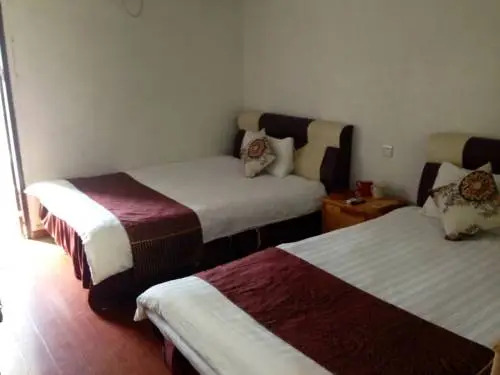 Жангжоу: Nanjing Tulou Maoyuan Inn