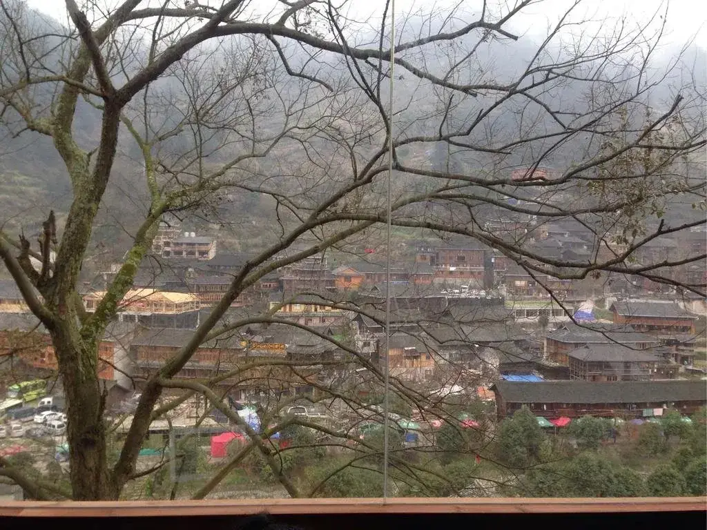 Леишан: Xingfuli Hostel Xijiang