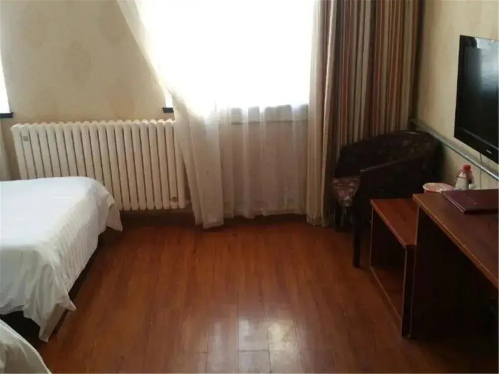 Циндао: Ou Lu Business Hotel