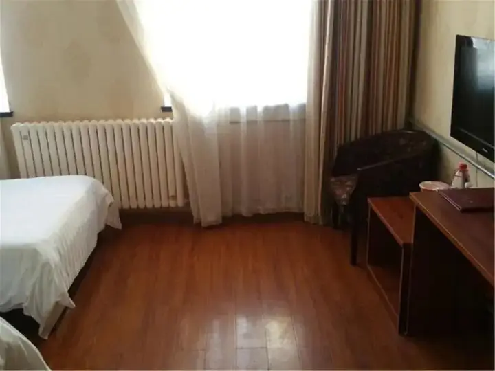 Циндао: Ou Lu Business Hotel