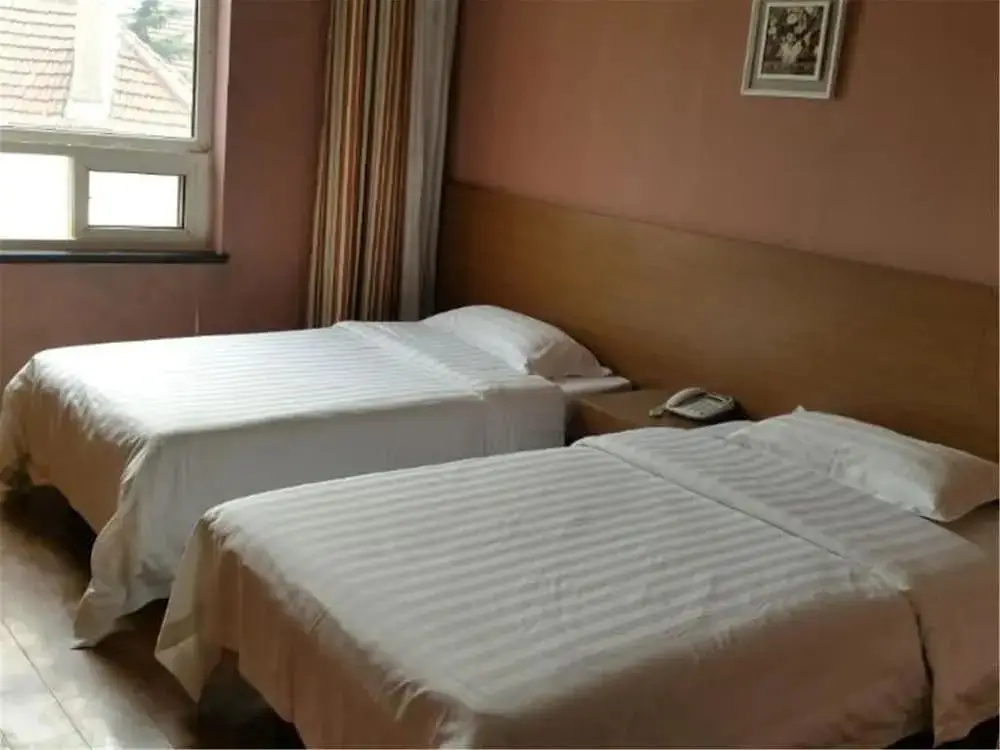 Циндао: Ou Lu Business Hotel