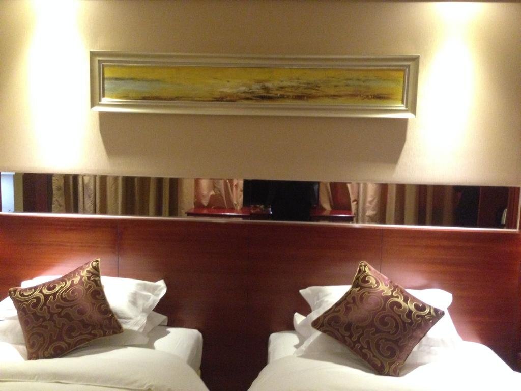 Цзыбо: Mintai International Business Hotel
