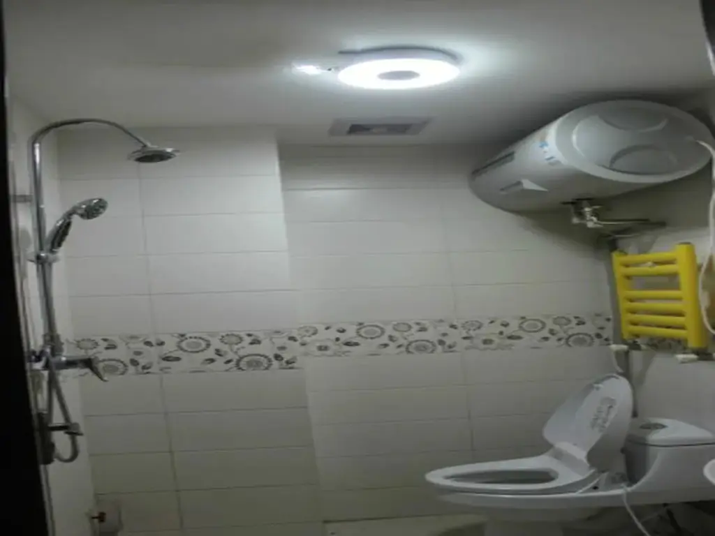 Циндао: Qingdao May Flower Apartment
