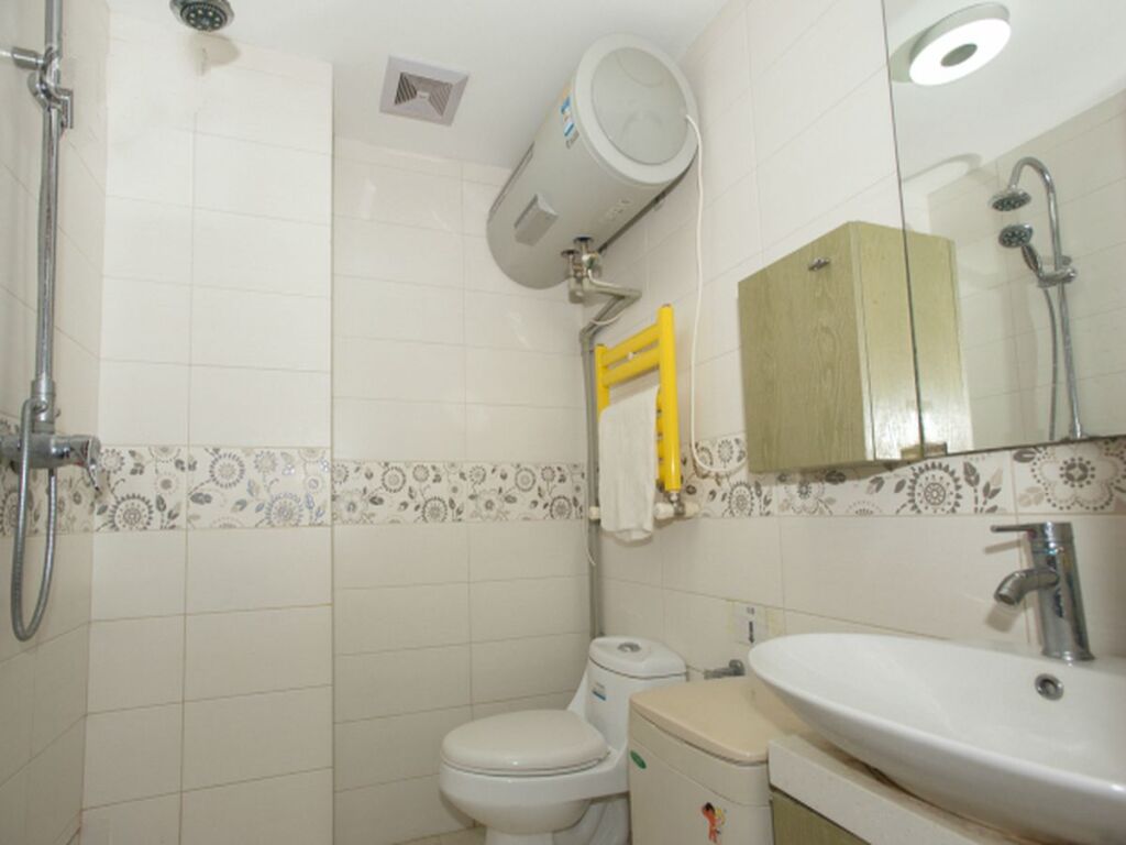 Циндао: Qingdao May Flower Apartment