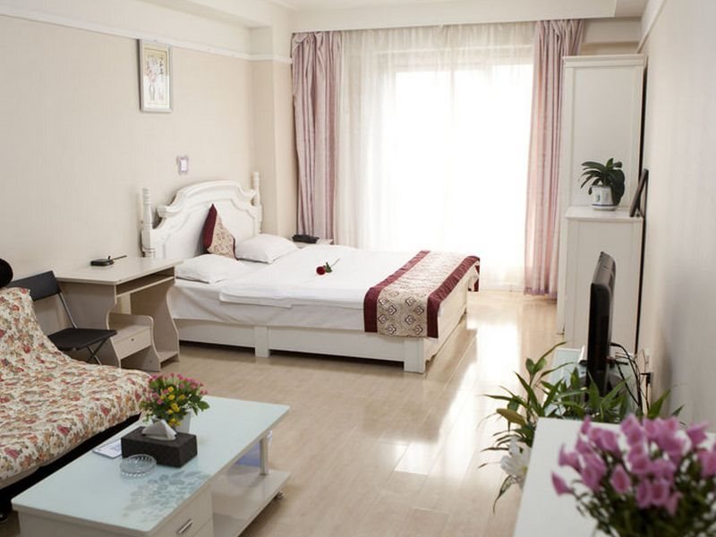 Далянь: Dalian Shiyuan Business Apartment Hotel