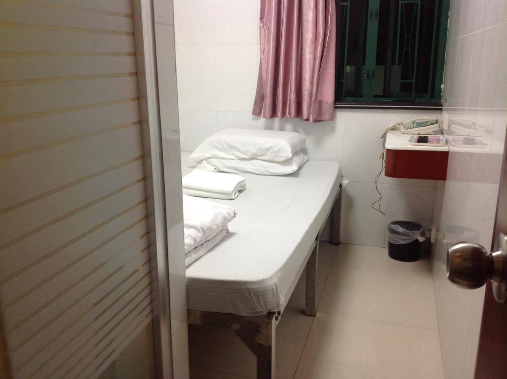 Гонконг: United co-operate Guest house