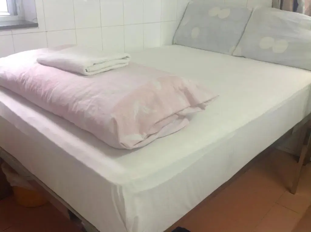 Гонконг: United co-operate Guest house