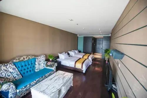 Циндао: Qingdao Yuehai Lanwan Seaview Resort Apartment