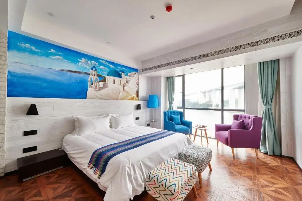 Aizhu Boutique Theme Hotel — фото 1