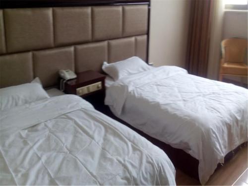 Чжанъе: Minle Tianyu Business Hotel
