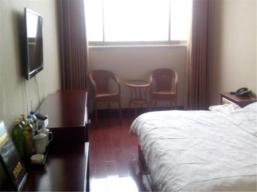 Чжанъе: Minle Tianyu Business Hotel