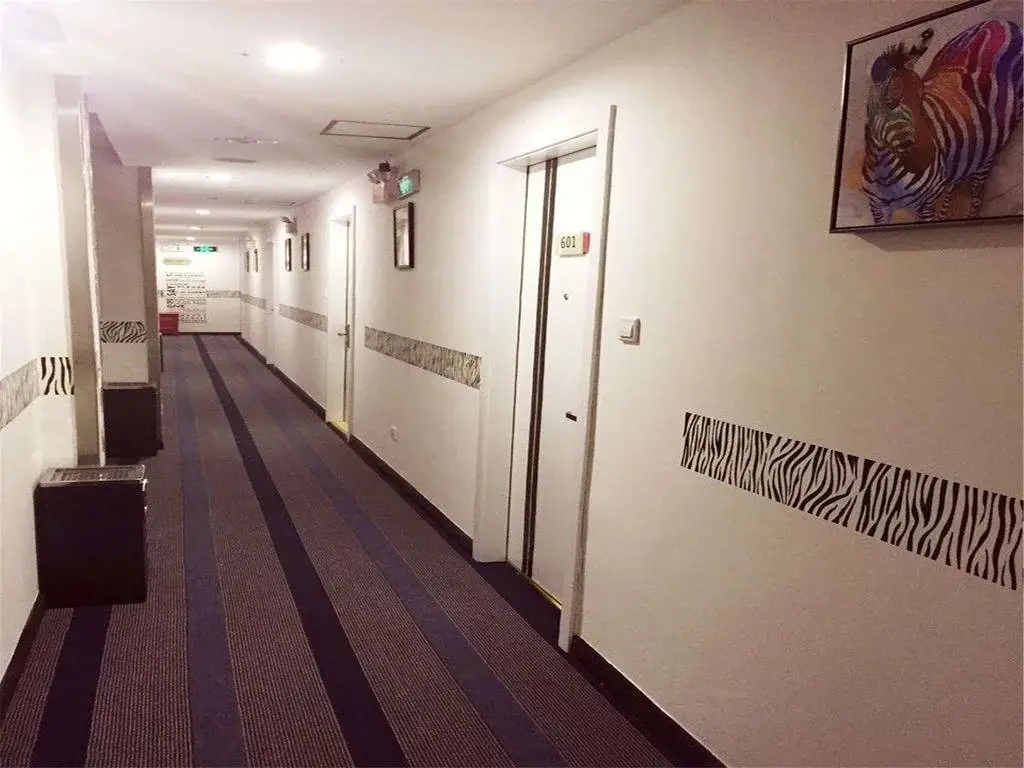 Наньтун: Qidong Xintianlei Fashion Hotel