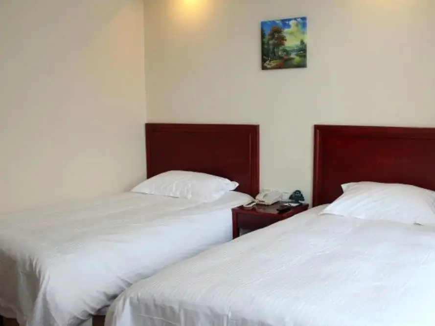 Яньтай: Greentree Inn Yantai Railway Station South Plaza J