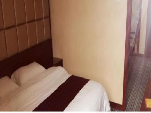 Шаньян: Huangjia Business Hotel
