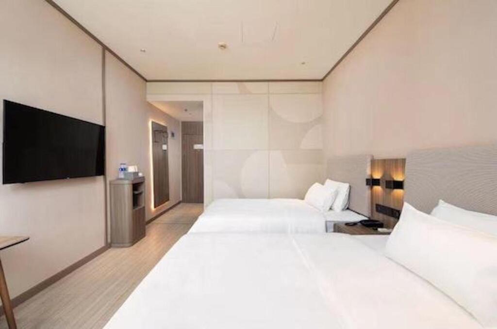 Шанхай: Hanting Hotel Shanghai Zhangjiang Road Metro Station