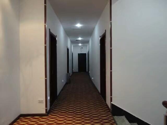 Цзюцзян: Junyi Business Inn