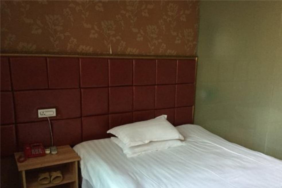 Цзюцзян: Junyi Business Inn